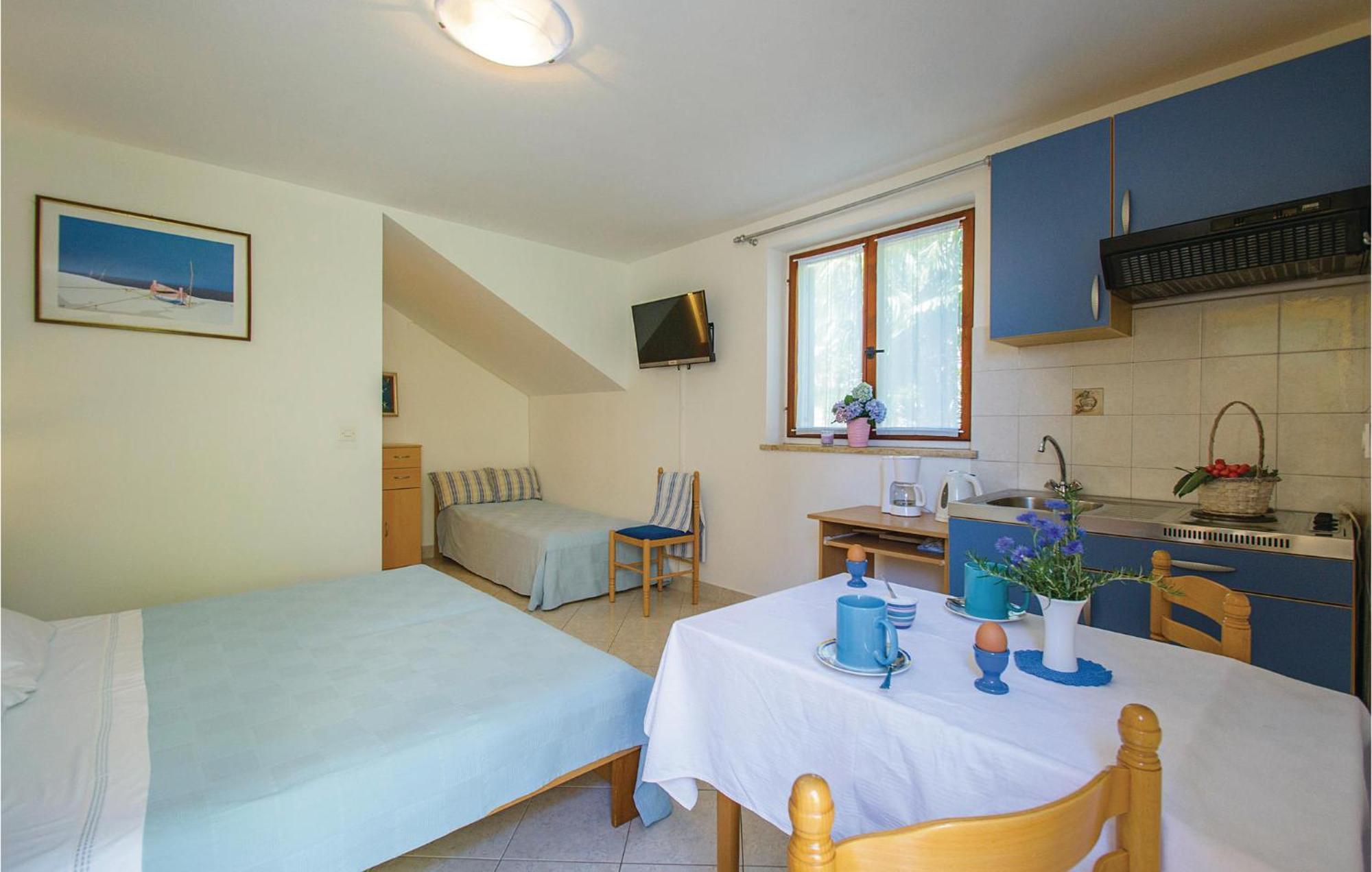 Beautiful Apartment In Rabac With Kitchen Екстер'єр фото