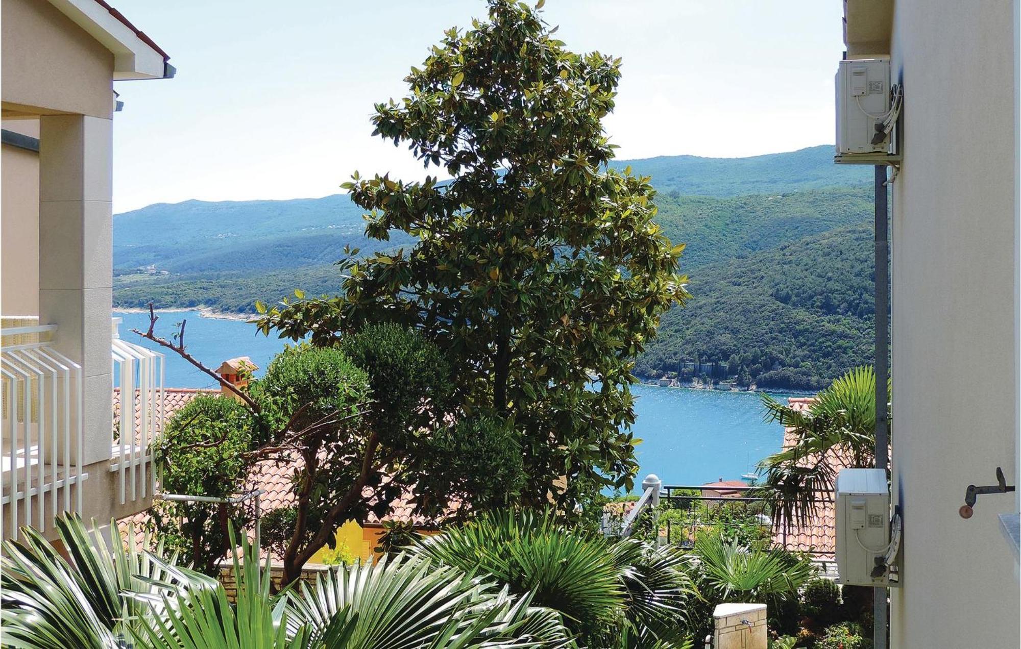 Beautiful Apartment In Rabac With Kitchen Екстер'єр фото